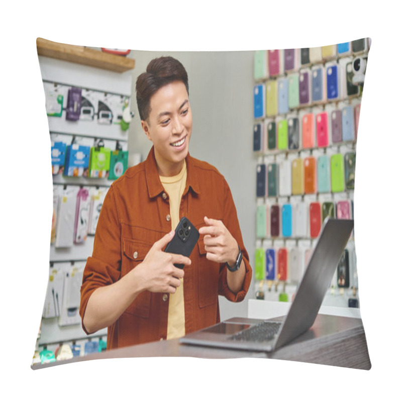 Personality  Smiling Asian Entrepreneur Showing Smartphone During Video Call On Laptop In Private Store Pillow Covers