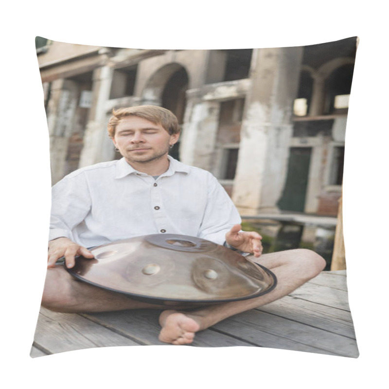 Personality  Musician with closed eyes playing hang drum on wooden pier in Venice  pillow covers