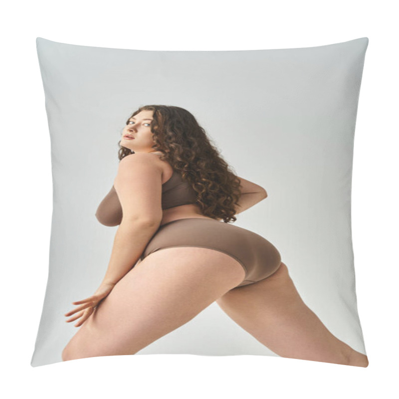 Personality  Alluring Curvy Girl In Underwear With Curly Brown Hair Posing From Sideways Against Grey Background Pillow Covers