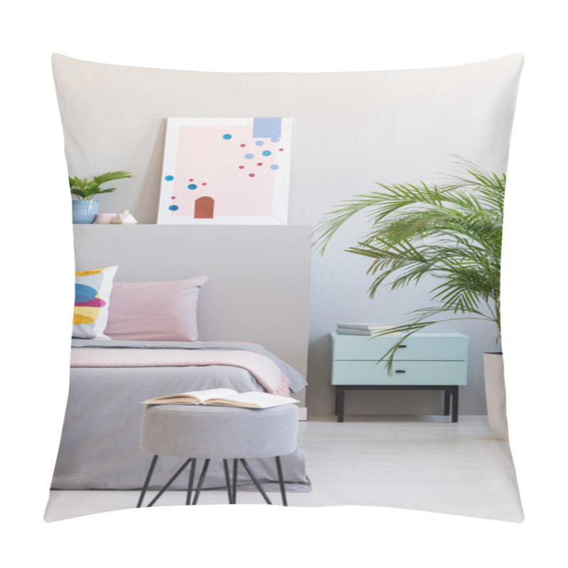 Personality  Abstract Poster In Real Photo Of Bright Bedroom Interior With Open Book On Hairpin Pouf, Fresh Plants And Bedside Table Pillow Covers