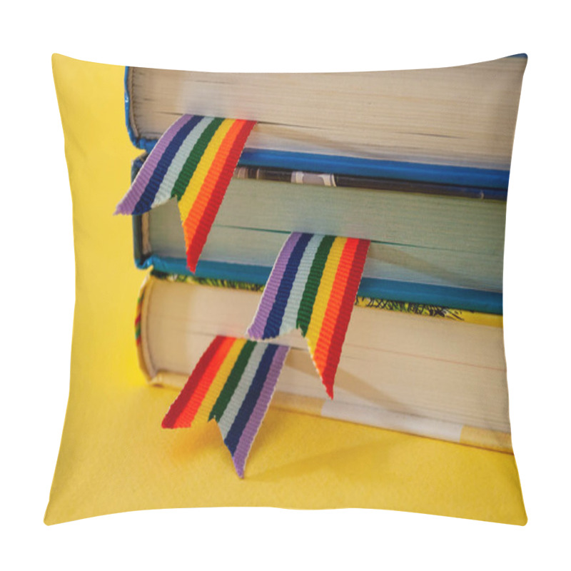 Personality  A Stack Of Three Books With Rainbow Ribbon Bookmarks Is On The Table. Concept Back To School, Freedom, Independence Pillow Covers