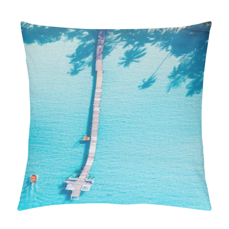 Personality  Crystal-clear Turquoise Waters Gently Lap Against A Long Wooden Pier, Casting Shadows From Swaying Palm Trees. A Small Boat Glides Through This Tropical Paradise, Showcasing Koh Kood's Serene Charm. Pillow Covers