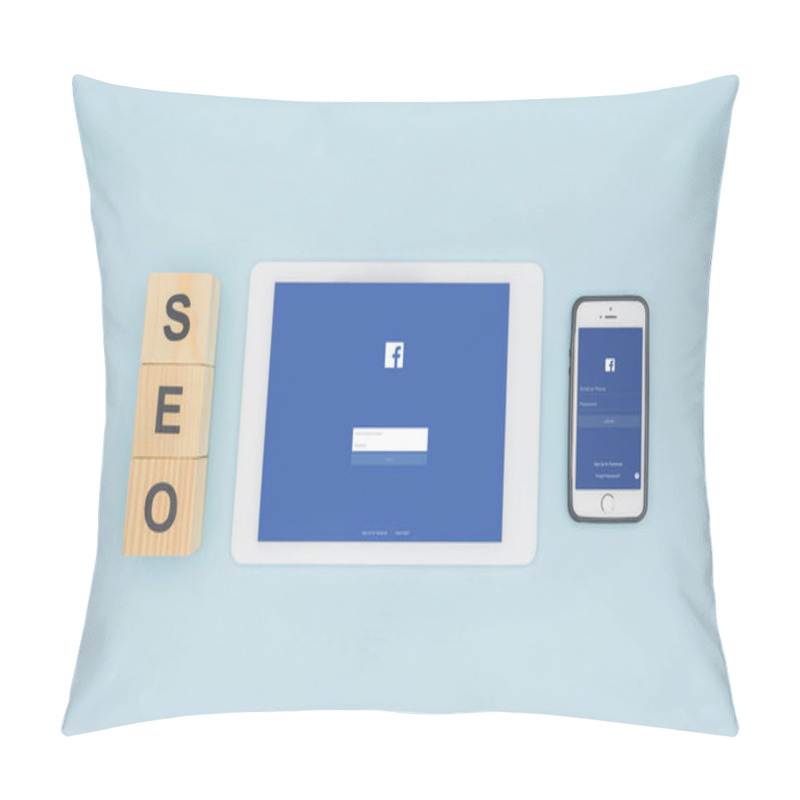 Personality  Top View Of Gadgets With Opened Facebook App On Light Blue Background  Pillow Covers