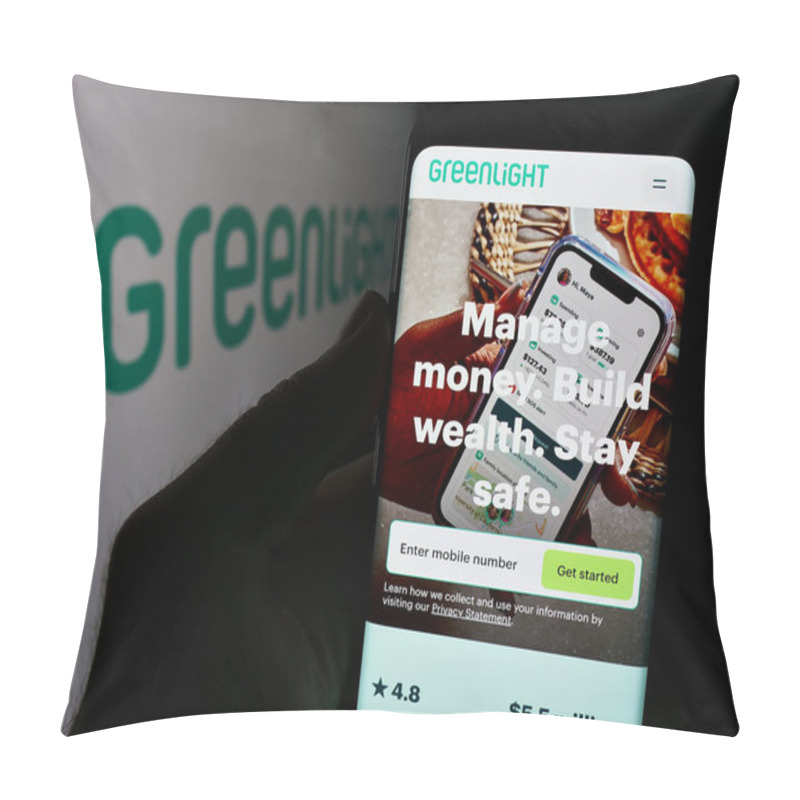 Personality  Stuttgart, Germany - 08-19-2024: Person Holding Cellphone With Webpage Of US Fintech Company Greenlight Financial Technology Inc. With Logo. Focus On Center Of Phone Display. Pillow Covers