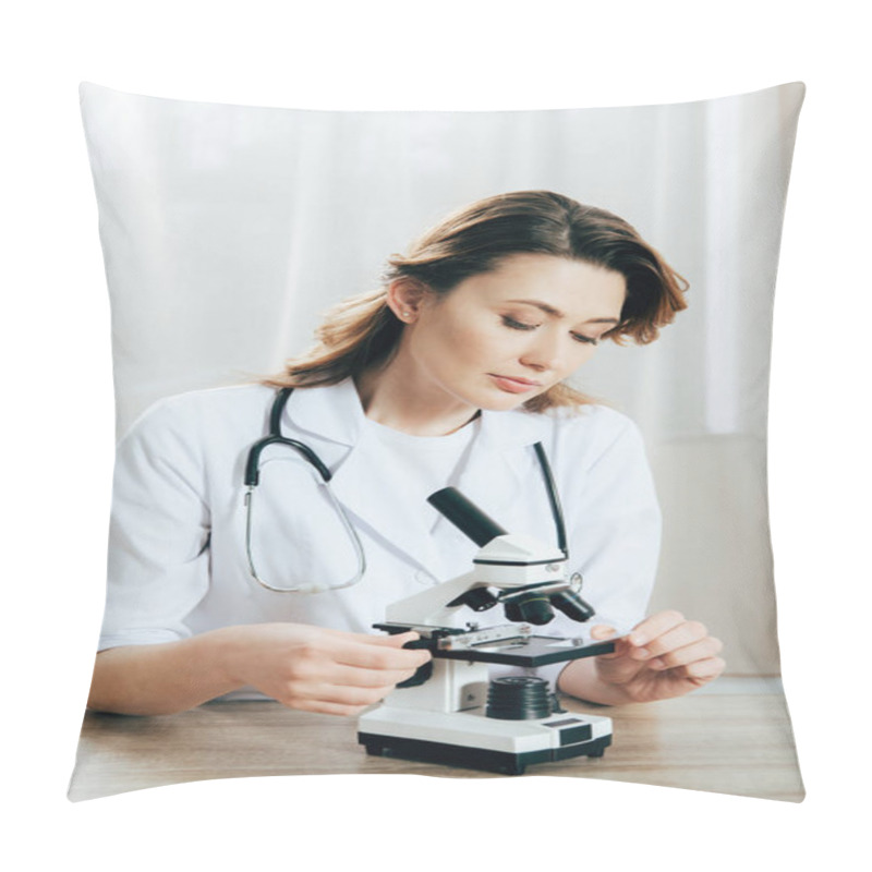 Personality  Doctor In White Coat Using Microscope In Clinic Pillow Covers