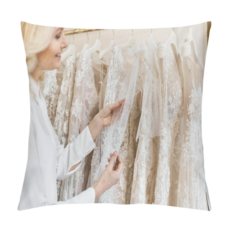 Personality  A Middle-aged Beautiful Shopping Assistant Browses Wedding Dresses On A Rack In A Bridal Salon. Pillow Covers