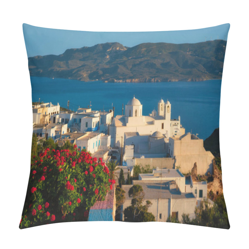 Personality  View Of Plaka Village On Milos Island Over Red Geranium Flowers On Sunset. Plaka Town, Milos Island, Greece.. Focus On Flowers Pillow Covers