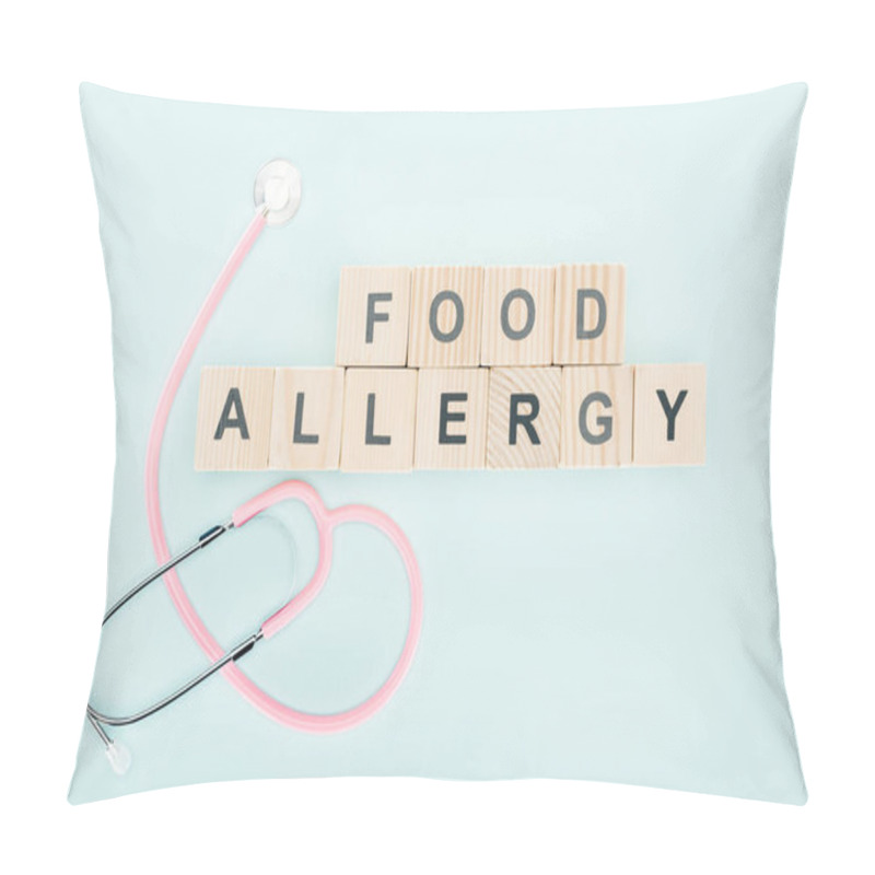 Personality  Top View Of Pink Stethoscope Near Wooden Blocks With Food Allergy Inscription Isolated On Blue  Pillow Covers