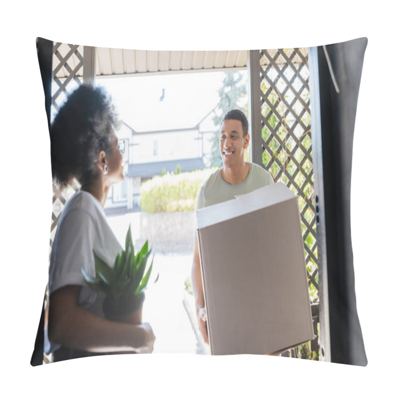 Personality  Smiling African American Man Holding Carton Box Near Girlfriend With Plant In Door Of New House Pillow Covers