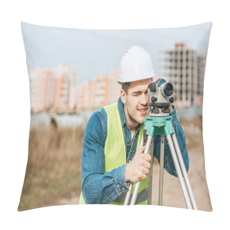 Personality  Smiling Surveyor In Hardhat And High Visibility Jacket Looking Through Digital Level  Pillow Covers