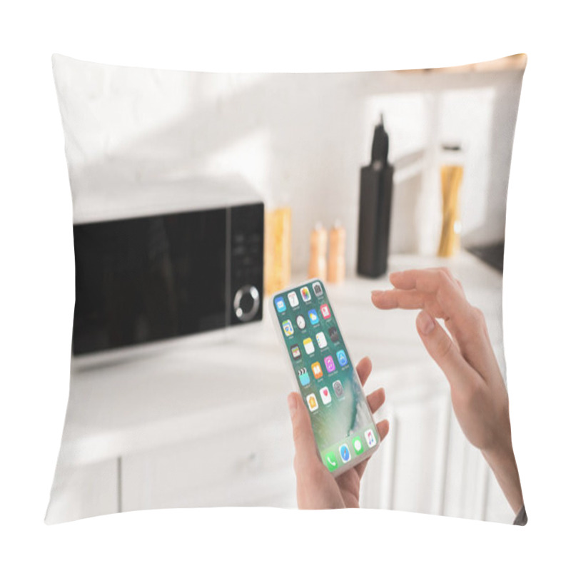 Personality  KYIV, UKRAINE - OCTOBER 9, 2019: Cropped View Of Woman Holding Smartphone With Apple Interface Pillow Covers