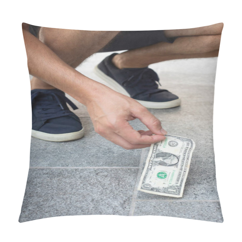 Personality  Anonymous Man, Casual Dressed, With Blue Sneakers, Picking Up One Dollar Bill From The Ground. Vertical Shot. Pillow Covers