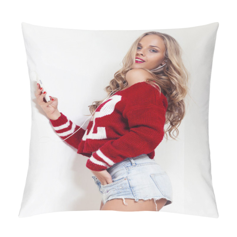 Personality  Beautiful  Blonde Woman With Long Curly Hair Wearing Red Shirt,jeans Shorts Poses Listening Music, Holding Phone And Earphones In Ears On White Studio Isolated Background.Perfect Clean Skin.Slim Body Pillow Covers