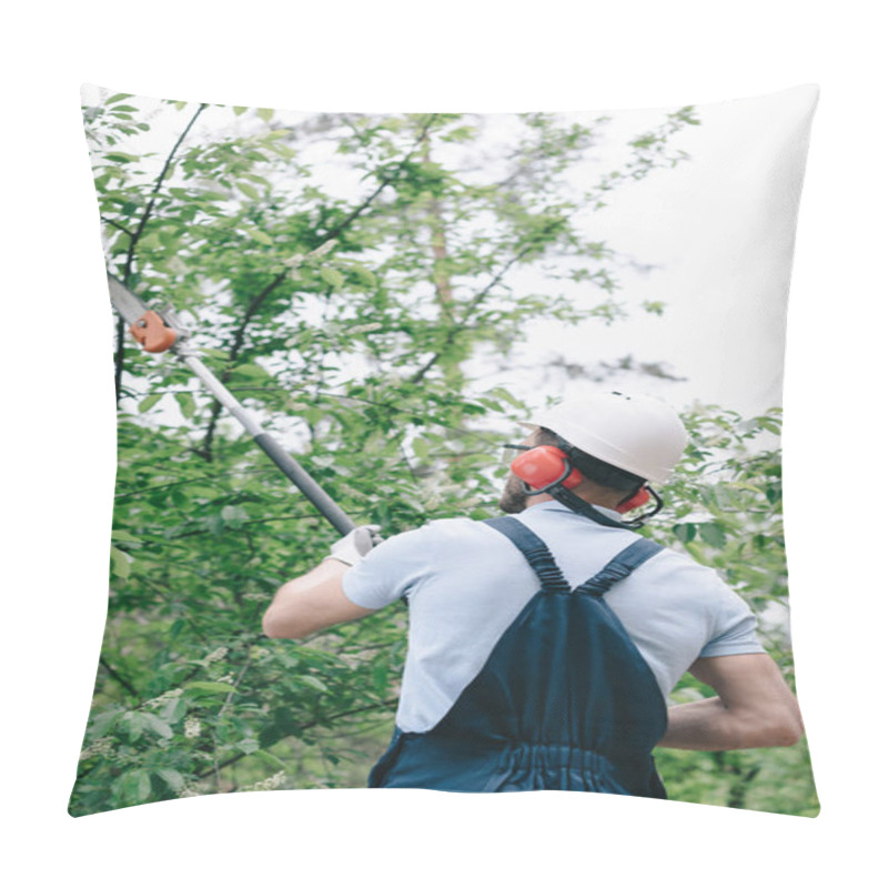 Personality  Back View Of Gardener In Helmet Trimming Trees With Telescopic Pole Saw Pillow Covers