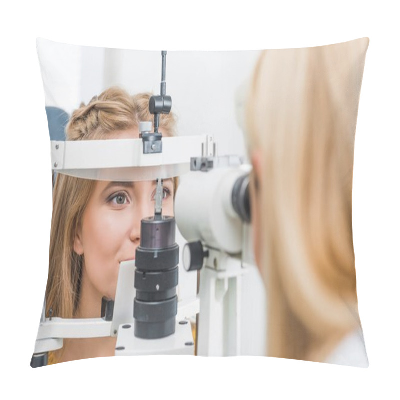 Personality  Female Optometrist Examining Patient Through Slit Lamp In Clinic Pillow Covers