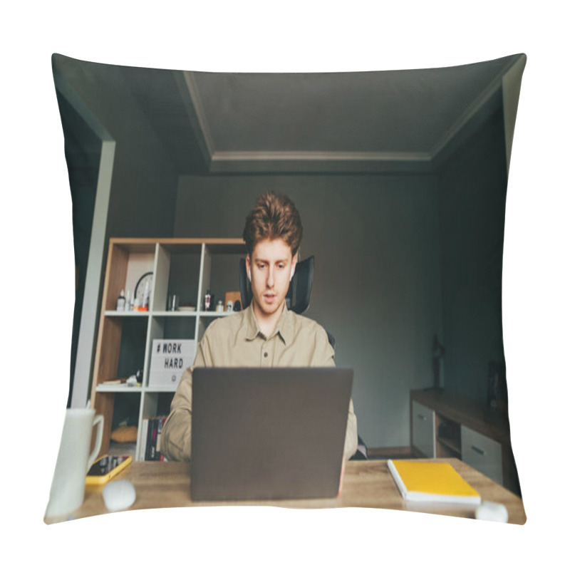 Personality  Handsome Freelance Programmer In A Shirt And Wireless Headphones Works On A Laptop At Home In A Cozy Bedroom, Looks Intently At The Screen And Writes Code. Work On The Internet At Home. Pillow Covers