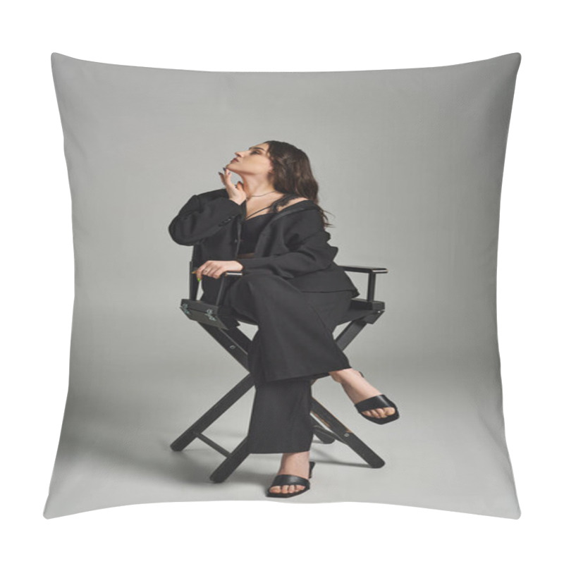 Personality  A Beautiful Plus Size Woman Wearing A Black Dress Sits Gracefully On A Chair Against A Gray Backdrop, Exuding Confidence. Pillow Covers