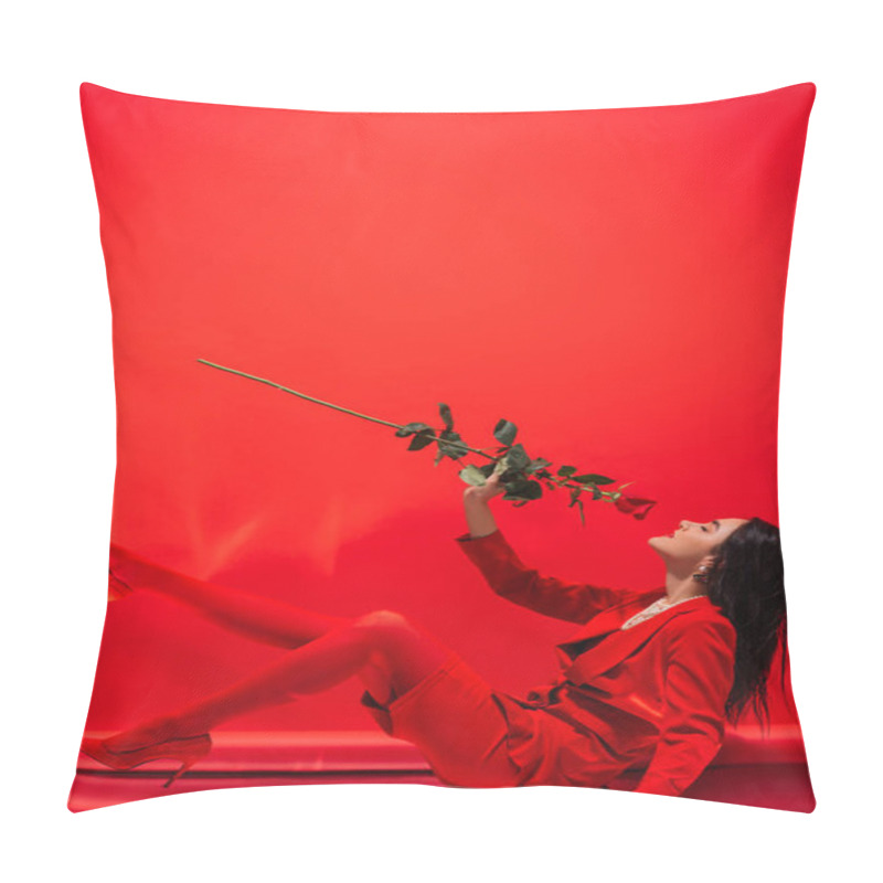 Personality  Side View Of Brunette Model In Heels Smelling Rose While Sitting On Red Background  Pillow Covers