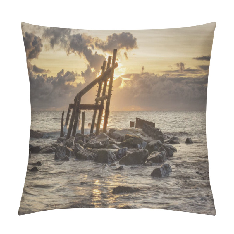 Personality  Weathered Timbers Of Eroded Wart Ime Defenses Standi Silhouetted, Against The Break Of Dawn, As The Tide Rolls In At Happisburgh Beach, Norfolk, UK Pillow Covers