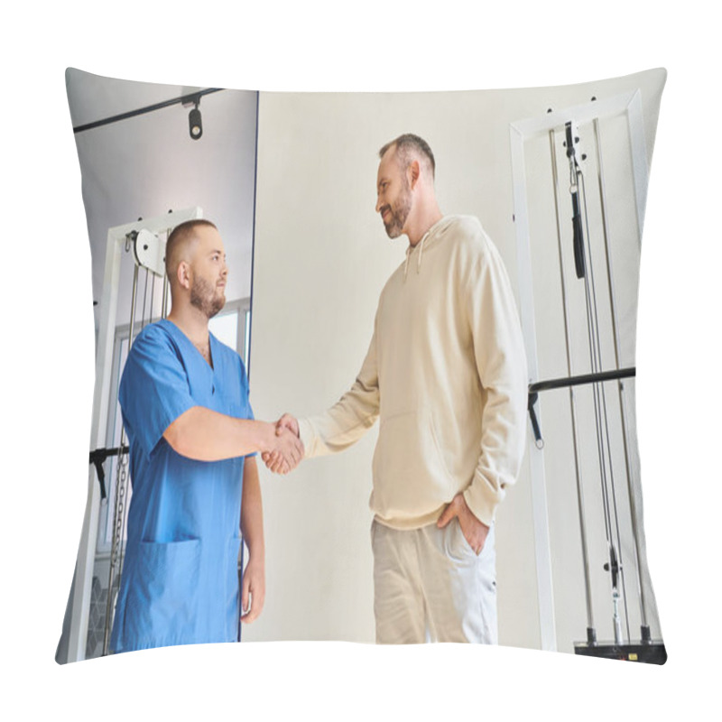 Personality  Smiling Man Shaking Hands With Young Doctor In Blue Uniform In Rehabilitation Kinesio Center Pillow Covers