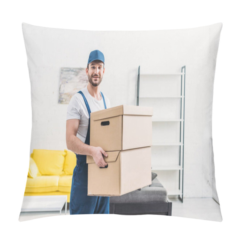 Personality  Handsome Mover In Uniform Looking At Camera While Carrying Cardboard Boxes In Apartment With Copy Space Pillow Covers