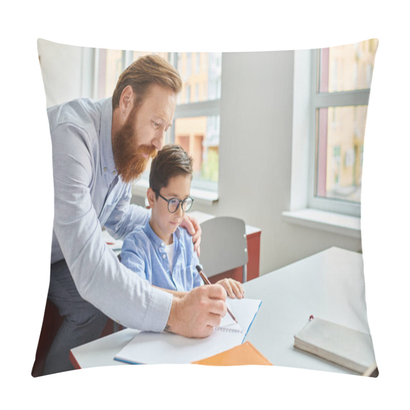 Personality  A Man Sitting At A Desk, Teaching A Young Boy In A Vibrant Classroom Setting. Pillow Covers