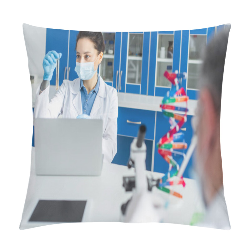 Personality  Geneticist In Medical Mask Working With Test Tube And Laptop Near Blurred Colleague Pillow Covers