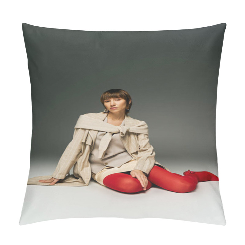 Personality  A Young Woman With Short Hair Sits On The Ground, Her Legs Crossed, Exuding Calm And Tranquility In A Studio Setting. Pillow Covers