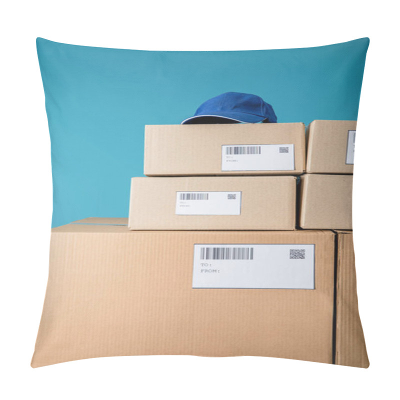 Personality  Cap On Stacked Cardboard Boxes With Qr And Barecodes Isolated On Blue Pillow Covers