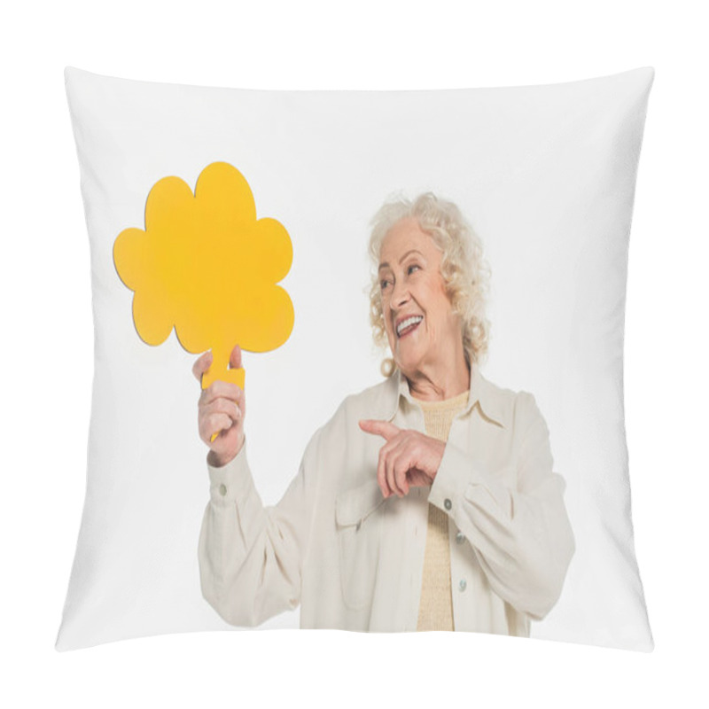 Personality  Smiling Elderly Woman Pointing With Finger At Yellow Thought Bubble In Hand Isolated On White Pillow Covers