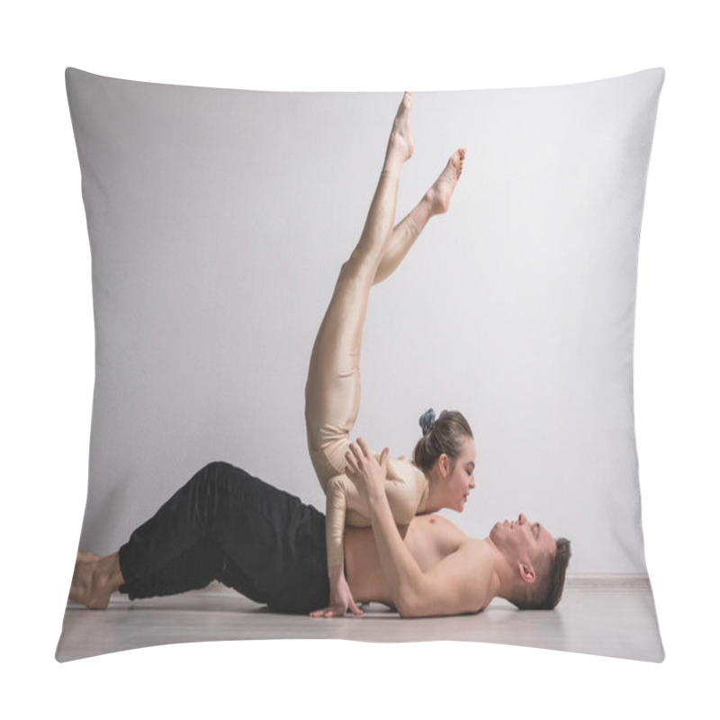 Personality  Acrobatic Couple Perform Number On A White Background. A Duet Of Gymnasts Rehearsing A Performance With Support. A Man And A Very Flexible Woman Are Dancing. Pillow Covers