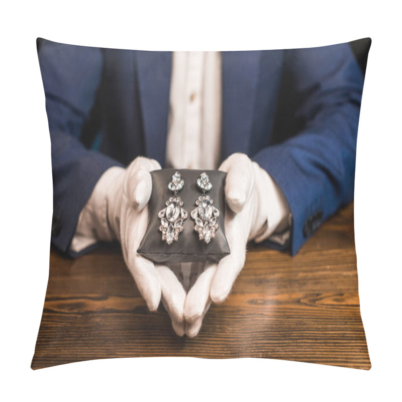 Personality  Cropped View Of Jewelry Appraiser Holding Jewelry Pillow With Earrings At Table Isolated On Black  Pillow Covers