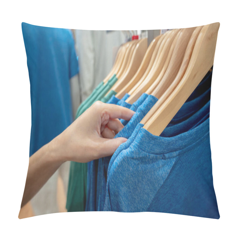 Personality  Woman Shopping Shirt In Clothing Store. Woman Choosing Clothes. Shirt On Hanger Hanging On Rack In Clothing Store. Fashion Retail Shop Inside Shopping Mall. Clothes On Hangers In A Clothes Shop. Pillow Covers