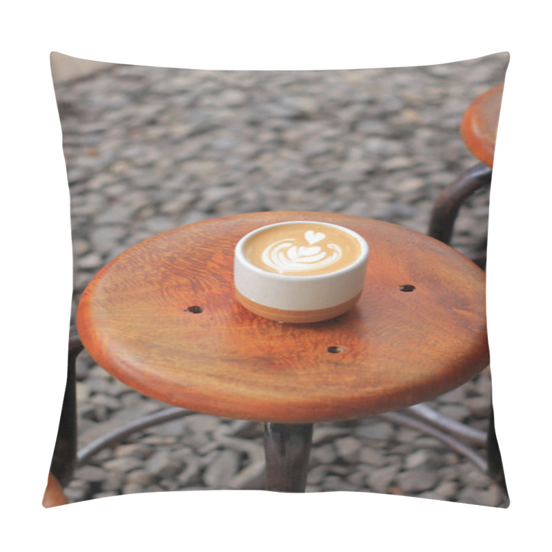 Personality  Latte Art Sits Pretty: Coffee Cup On Wooden Stool With Pebble Background Enhances Cafe Vibes Pillow Covers