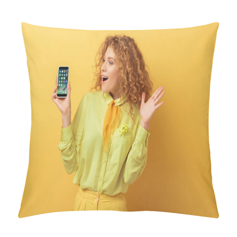 Personality  KYIV, UKRAINE - FEBRUARY 4, 2020: Excited Redhead Woman Looking At Iphone On Yellow  Pillow Covers