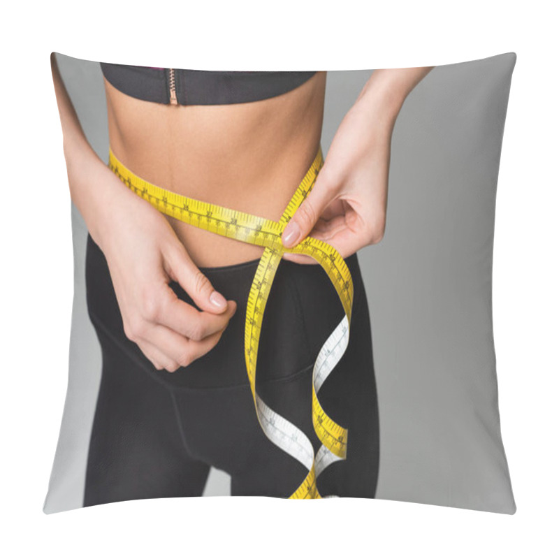 Personality  Partial View Of Sportswoman Measuring Waist Isolated On Grey Pillow Covers