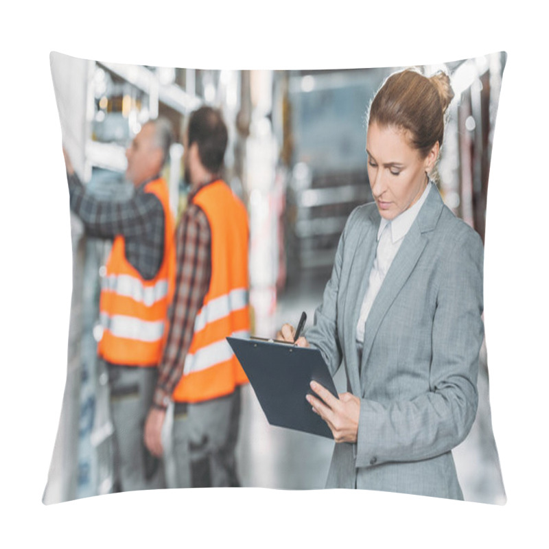 Personality  Female Inspector Writing Something While Men Working Behind In Storehouse Pillow Covers