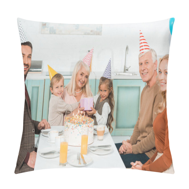 Personality  Cheerful Kids Sitting On Laps Of Grandmother While Sitting Near Birthday Cake With Family Pillow Covers