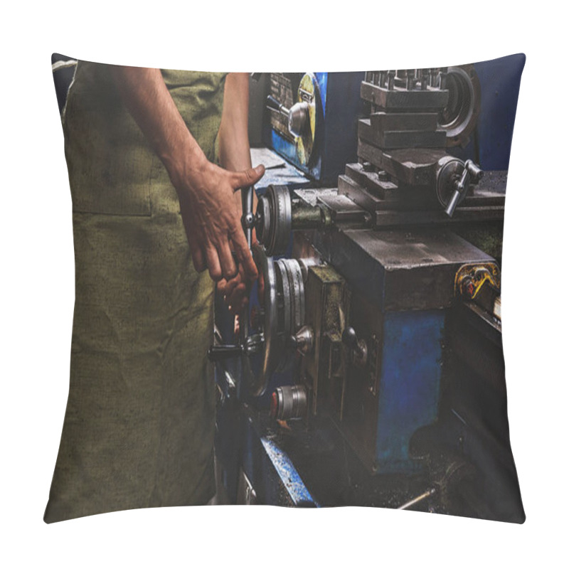 Personality  Cropped Image Of Male Manufacture Worker In Protective Apron Using Machine Tool At Factory Pillow Covers