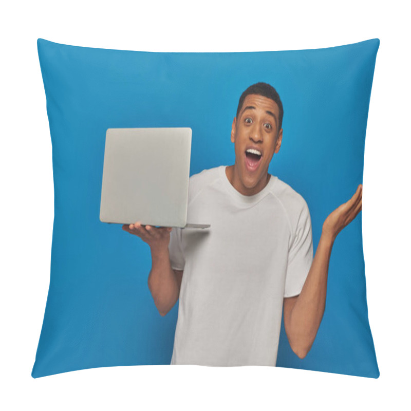 Personality  Excited African American Man Gesturing And Holding Laptop On Blue Background, Remote Work Concept Pillow Covers