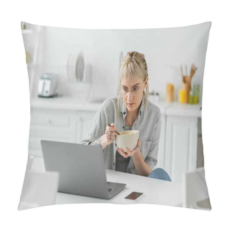 Personality  Young Woman With Bangs And Tattoo On Hand Eating Cornflakes For Breakfast While Using Laptop Near Smartphone With Blank Screen And Cup Of Coffee On Table In Modern Kitchen, Freelancer  Pillow Covers