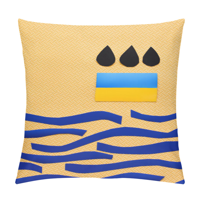 Personality  Top View Of Black Drops Above Ukrainian Flag And Paper Sea On Textured Yellow Background  Pillow Covers