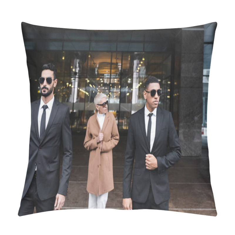 Personality  Multiethnic Bodyguards In Sunglasses Escorting Mature Businesswoman Near Hotel Entrance Pillow Covers