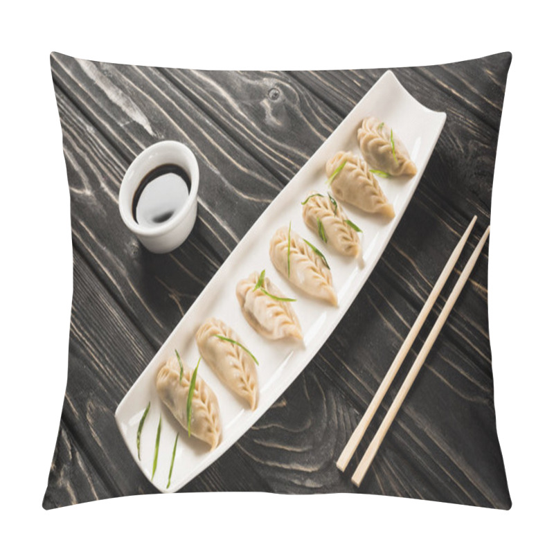 Personality  Delicious Chinese Boiled Dumplings On Plate Near Chopsticks And Soy Sauce On Black Wooden Table Pillow Covers