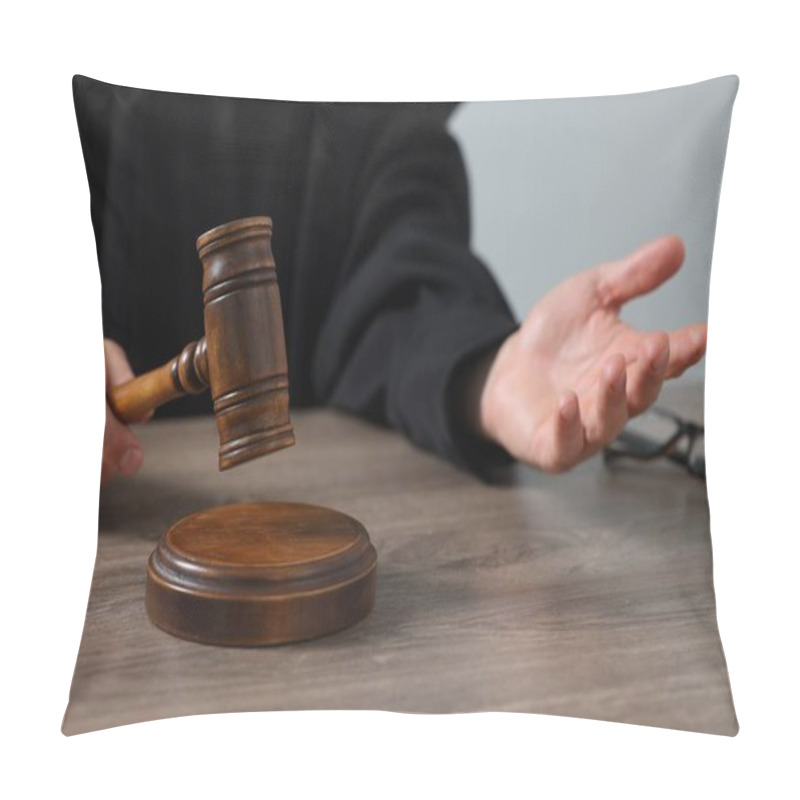 Personality  Judge With Gavel Sitting At Wooden Table Against Light Grey Background, Closeup Pillow Covers