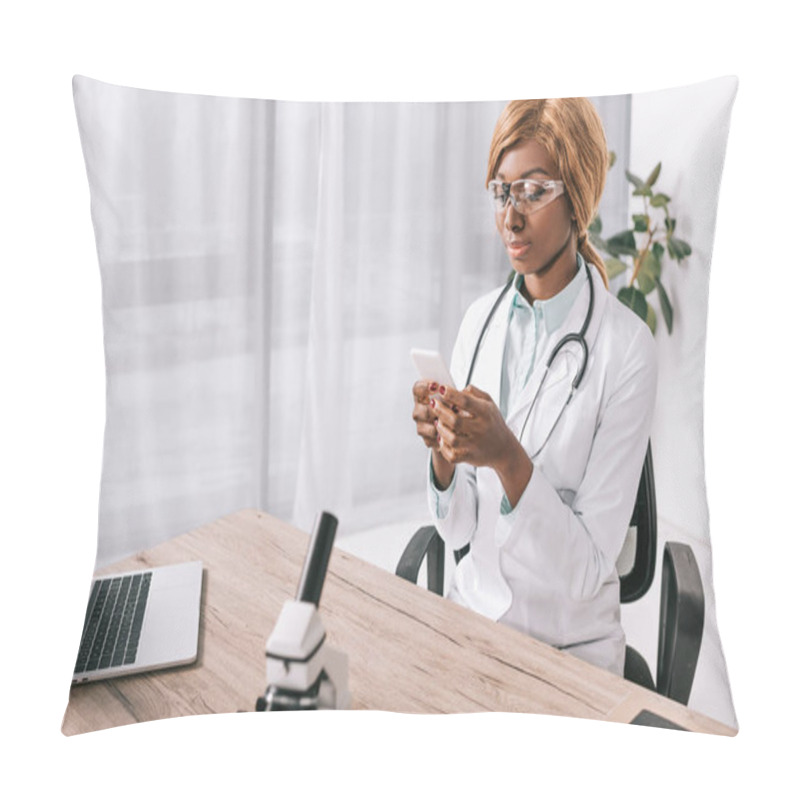 Personality  Attractive African American Scientist  Sitting In Goggles And Using Smartphone In Laboratory Pillow Covers