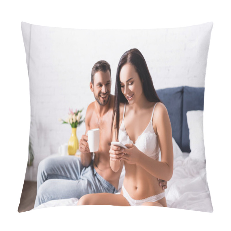 Personality  Smiling Man With Cup Of Coffee Hugging Sexy Woman In Lingerie, Texting On Smartphone On Blurred Background In Bedroom Pillow Covers