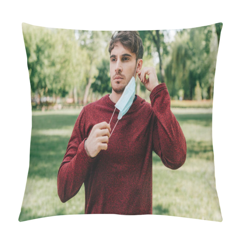 Personality  Handsome Sportsman Taking Off Medical Mask In Park  Pillow Covers