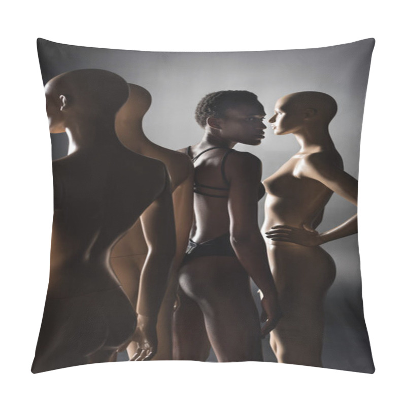 Personality  Young African American Model In Bodysuit Standing Between Dummies On Black   Pillow Covers