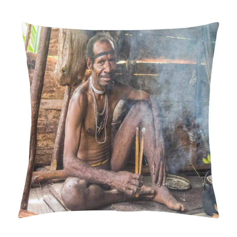 Personality  Papua, Indonesia - January 15, 2015: Man Of The Nomadic Forest Tribe Korowai In His Home. Pillow Covers